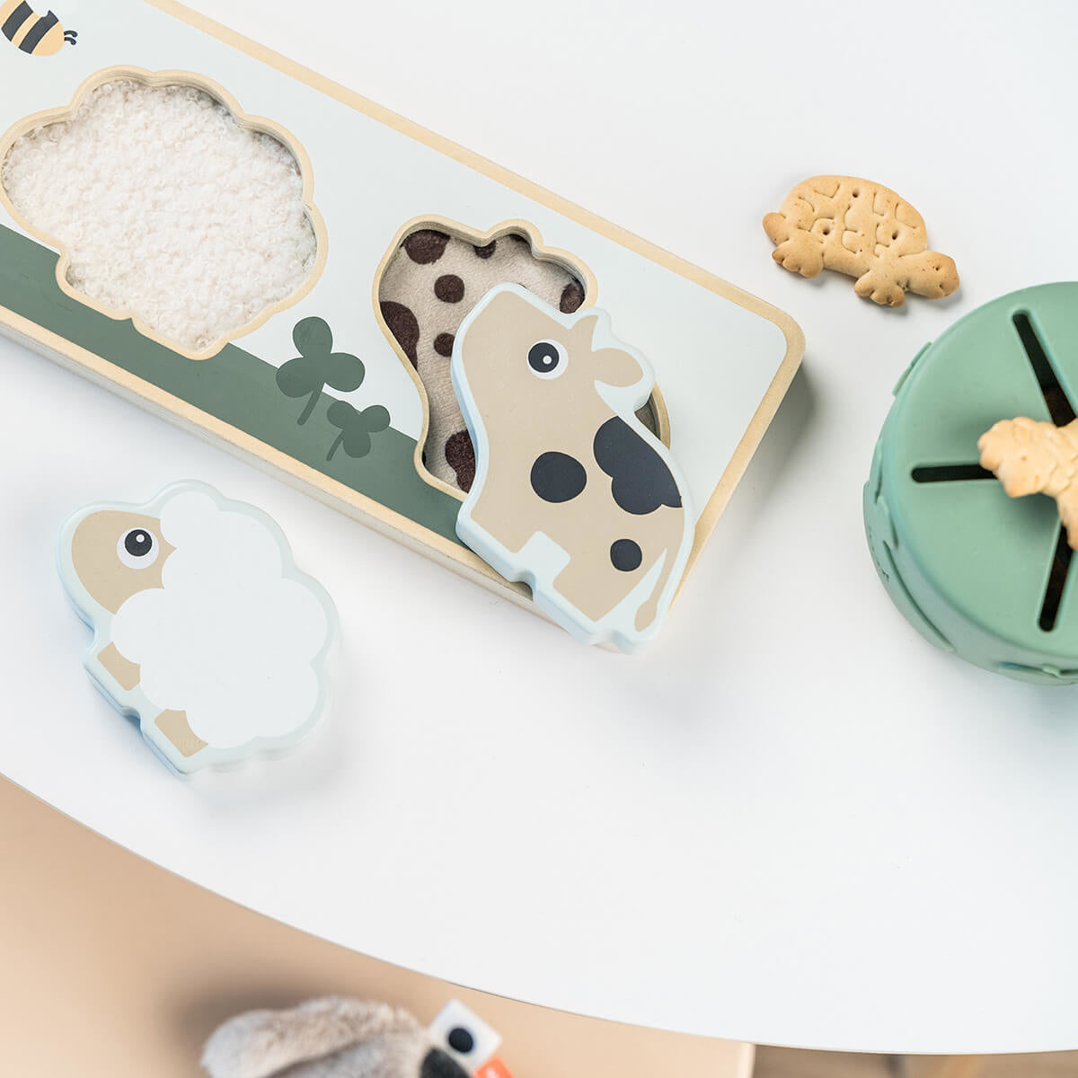 Done by Deer® Senzorična sestavljanka Tiny Farm Done by Deer