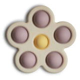 Mushie® Dječja igračka POP-IT Flower Soft Lilac/Pale Daffodil/Ivory/Sand