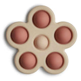 Mushie® Dječja igračka POP-IT Flower Rose/Blush/Shifting Sand