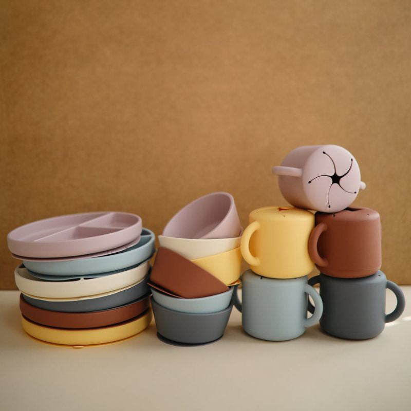 Mushie® Silikonska skledica z vakuumskim dnom Ivory Mushie