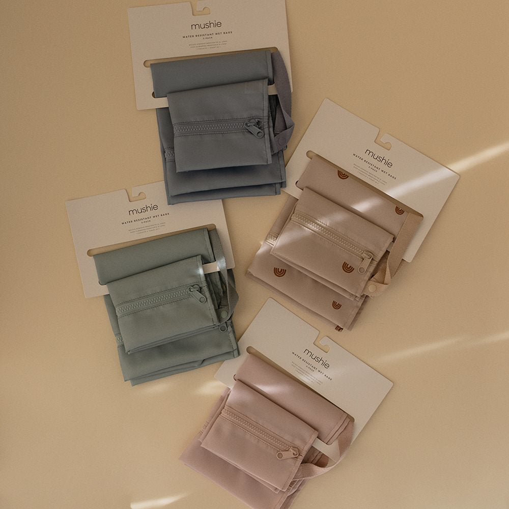 Mushie® Vodoodporna torbica za shranjevanje 2 kosa Rainbow Mushie