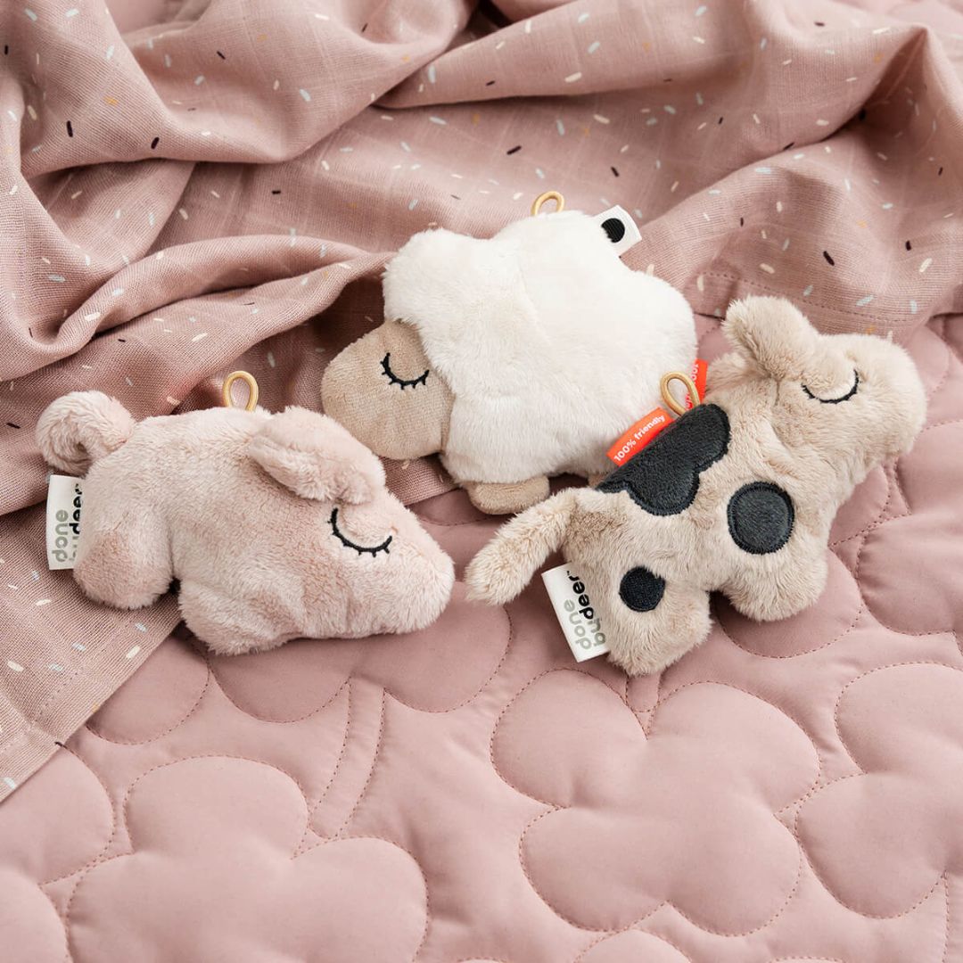 Done by Deer® Mehka senzorična ropotuljica Sheepy Sand Done by Deer