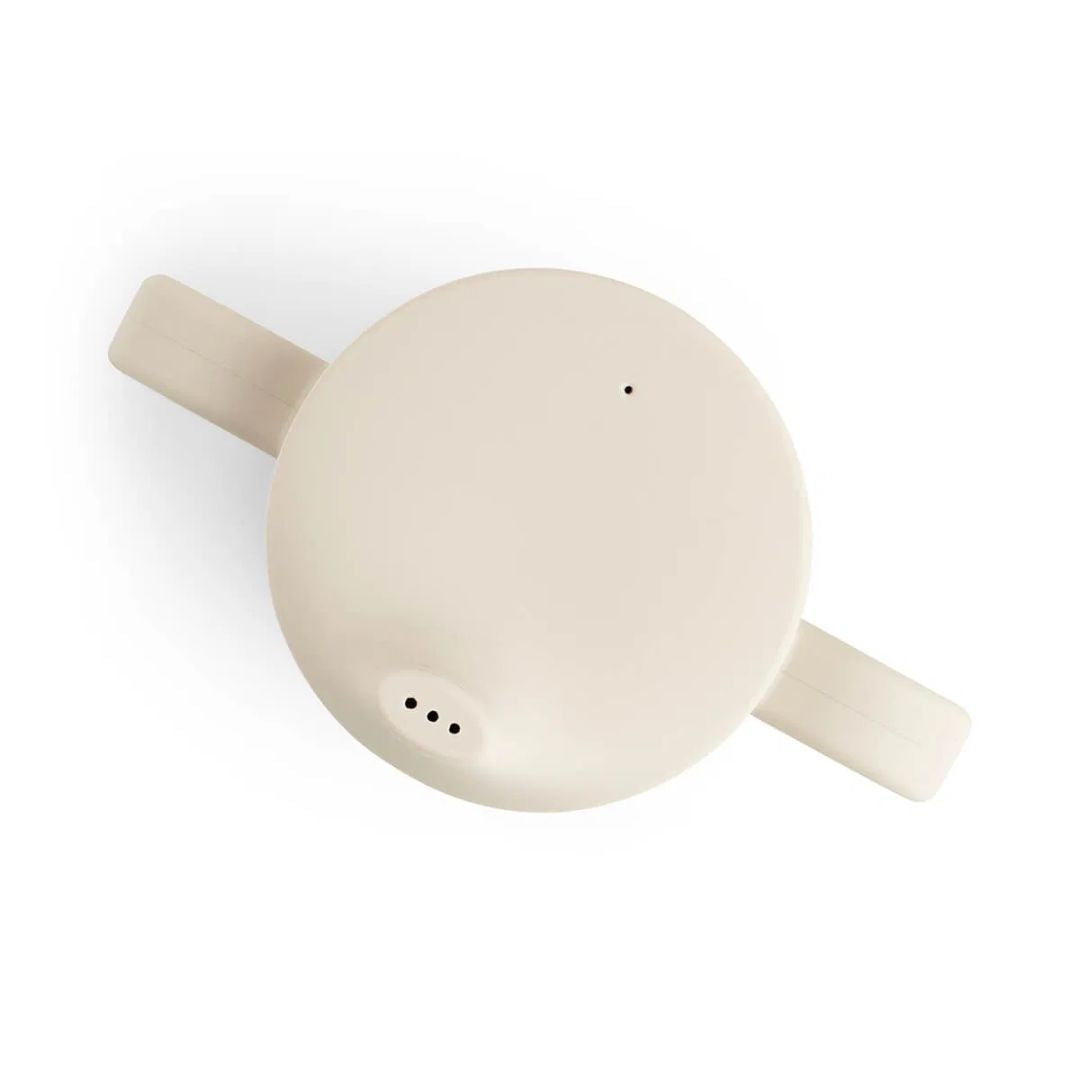 Done by Deer® Silikonski lonček s pokrovčkom in ročaji Celebration Sand Done by Deer