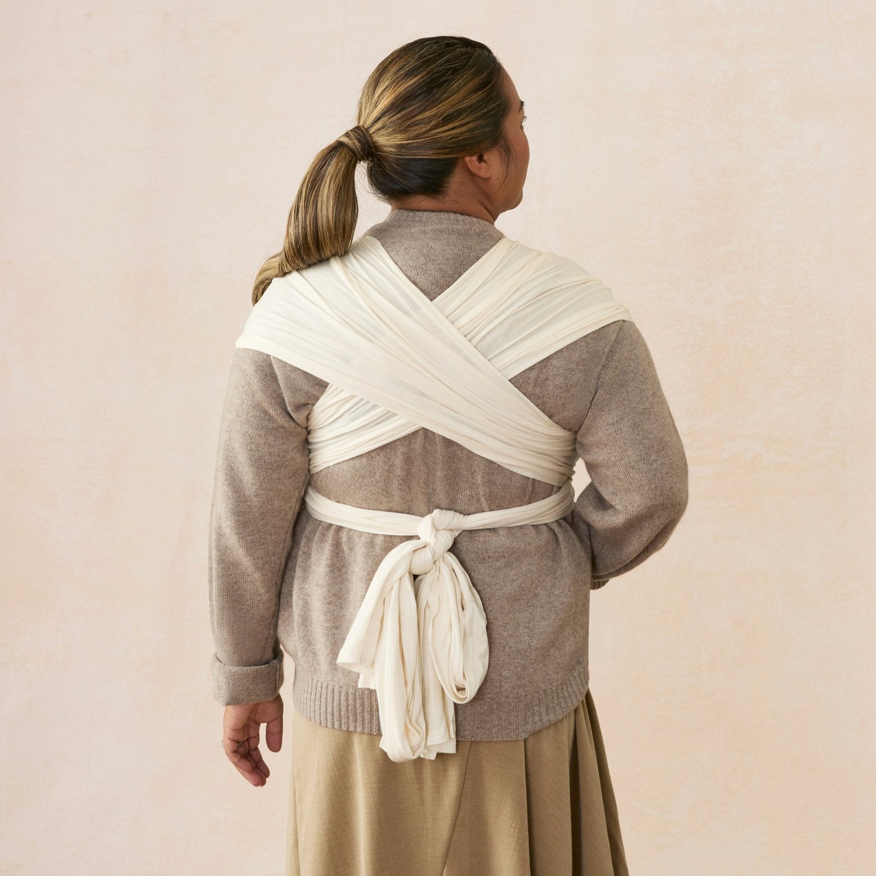 Ergobaby® Fascia porta bebè Aura Wrap Sustainable Knit Cream