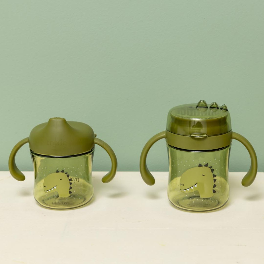 Trixie Baby® Skodelica za učenje pitja iz tritana Mr. Dino 200ml Trixie Baby