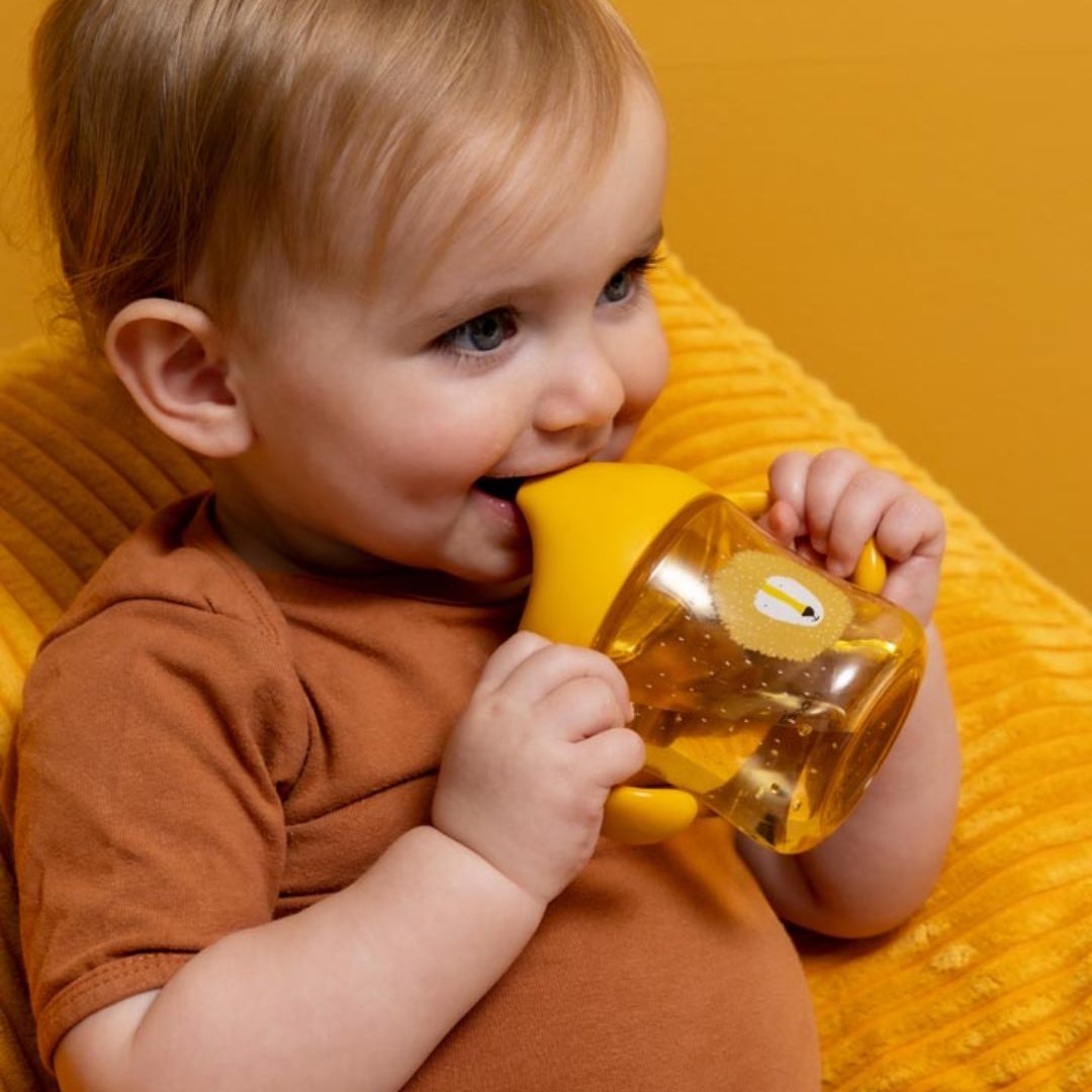 Trixie Baby® Skodelica za učenje pitja iz tritana Mr. Lion 200ml Trixie Baby