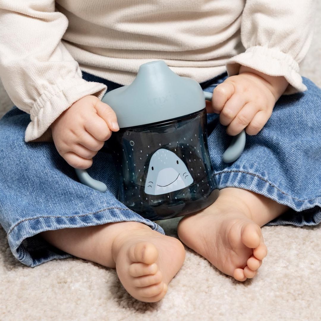 Trixie Baby® Skodelica za učenje pitja iz tritana Mr. Shark 200ml Trixie Baby